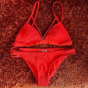 Ron Jon bikini red/orange color. Xtra small top with small bottoms.